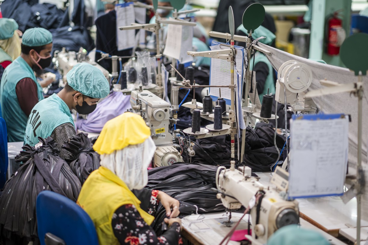 How can we refocus industry efforts to improve our impact on textile workers’ lives?